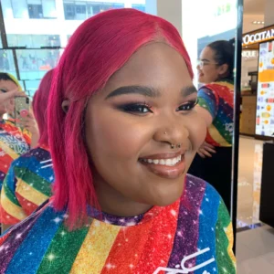 Bold and colorful makeup look with graphic liner and vibrant hues, a style taught in Ottawa Group Cosmetic Workshops by Waring Makeup.