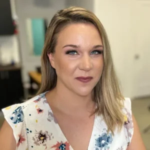 Bold and colorful makeup look with graphic liner and vibrant hues, a style taught in Ottawa Group Cosmetic Workshops by Waring Makeup.