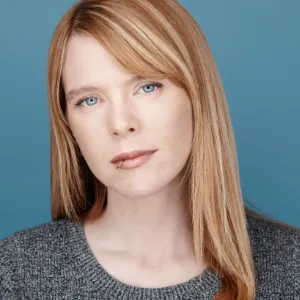 Testimonial of Waring Makeup - Ottawa Makeup Artist by Jen B Client with professional makeup and sleek blonde hair, styled by Waring Makeup, Ottawa Corporate Makeup Artist.