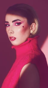 Creative editorial makeup with graphic pink eyeliner and bold styling, done by Waring Makeup, Ottawa Editorial Makeup Artist.