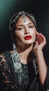 Woman with red lips, jeweled accessories, and full glam makeup, styled by Waring Makeup, Ottawa Special Event Makeup Artist.