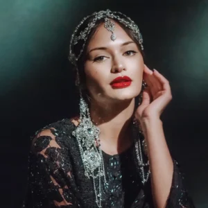 High-fashion editorial makeup with jeweled details and bold red lips, styled by Waring Makeup, Ottawa Fashion Shoot Makeup.