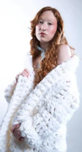 Woman in a white knit wrap with glowing natural makeup styled by Waring Makeup, Ottawa Lifestyle Makeup Artist.