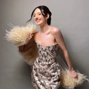 Prom glam makeup with a feathered dress and glowing skin, styled by Waring Makeup, Ottawa Prom Makeup Artist.
